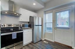 Upscale Little Italy Two Bedroom w/ Private Drive